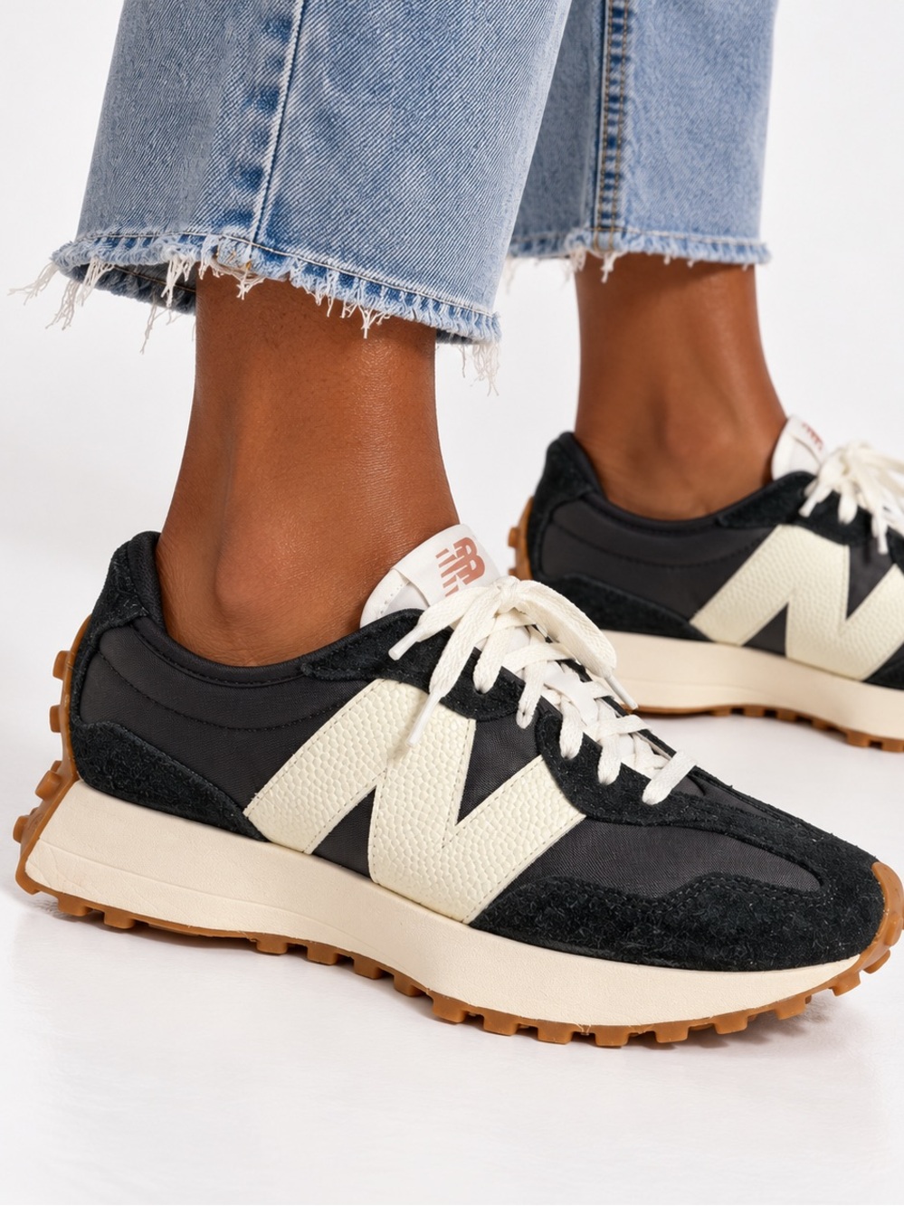 NEW BALANCE Black and White Sneakers